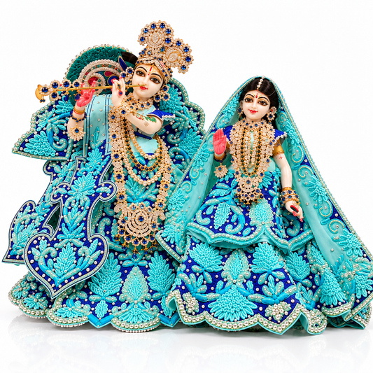 Handcrafted floral embroidery and pearl border on Radha Krishna deity dress